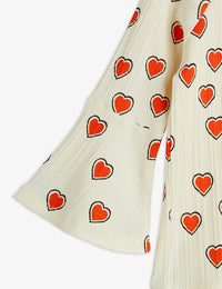 Outlined hearts trumpet sleeve top