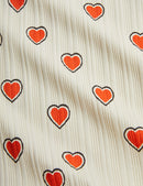 Outlined hearts flared trousers