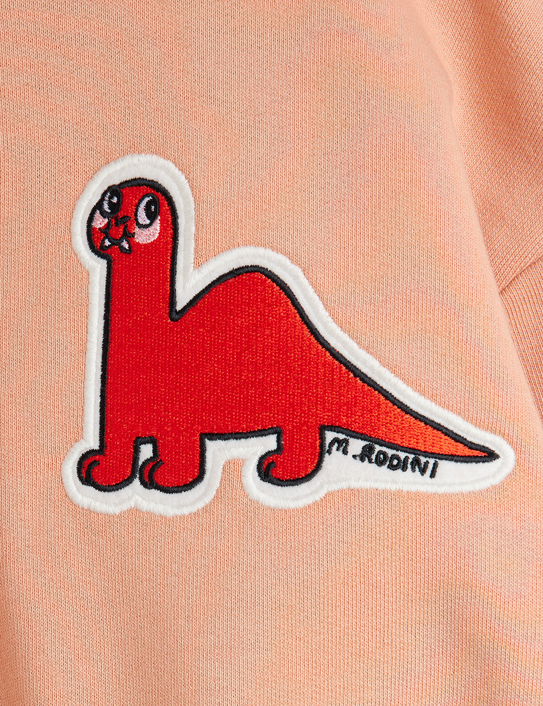 Dino patch sweater