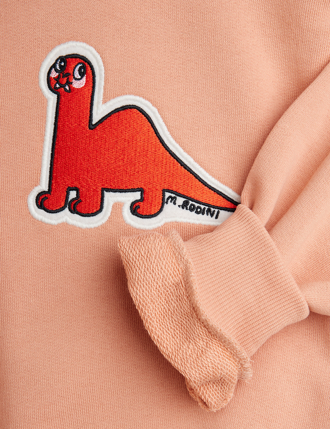 Dino patch sweater